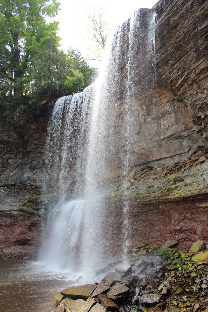 view from the side of the base of indian falls owen sound ontario waterfall
